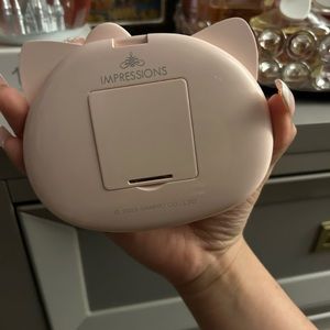 Hello kitty mirror .